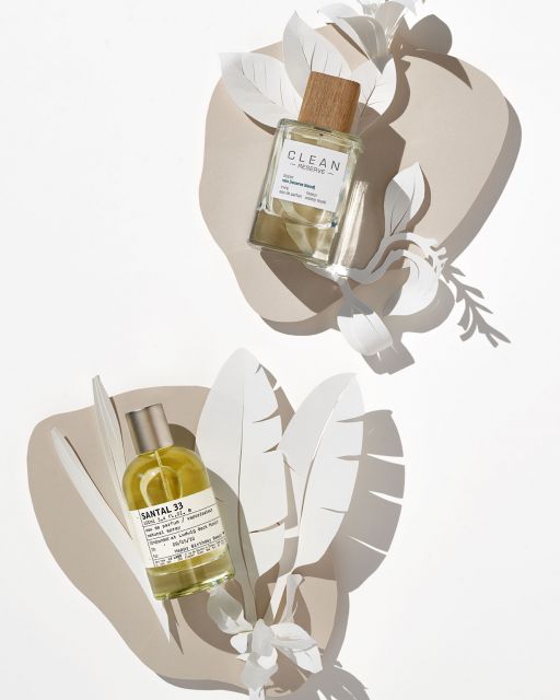 LUDWIG BECK Beauty: Fragrance photo shoot for the spring/sommer 2020 edition Still life with 2 fragrances, white paperart on beige paper