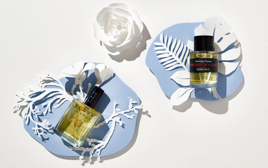 LUDWIG BECK Beauty: Fragrance photo shoot for the spring/sommer 2020 edition Still life with 2 fragrances, white paperart on blue paper