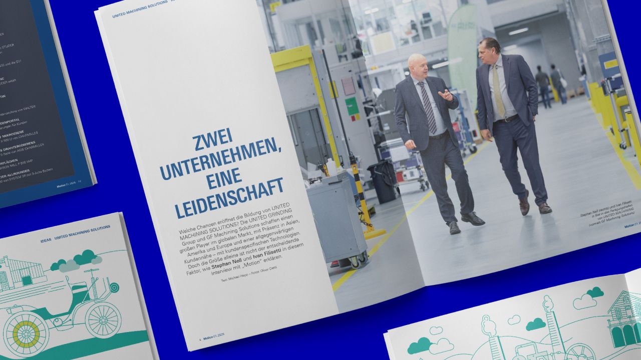 Double-page spread in the customer magazine “Motion” with the headline “Two companies, one passion” and a photo of two managing directors in a production hall